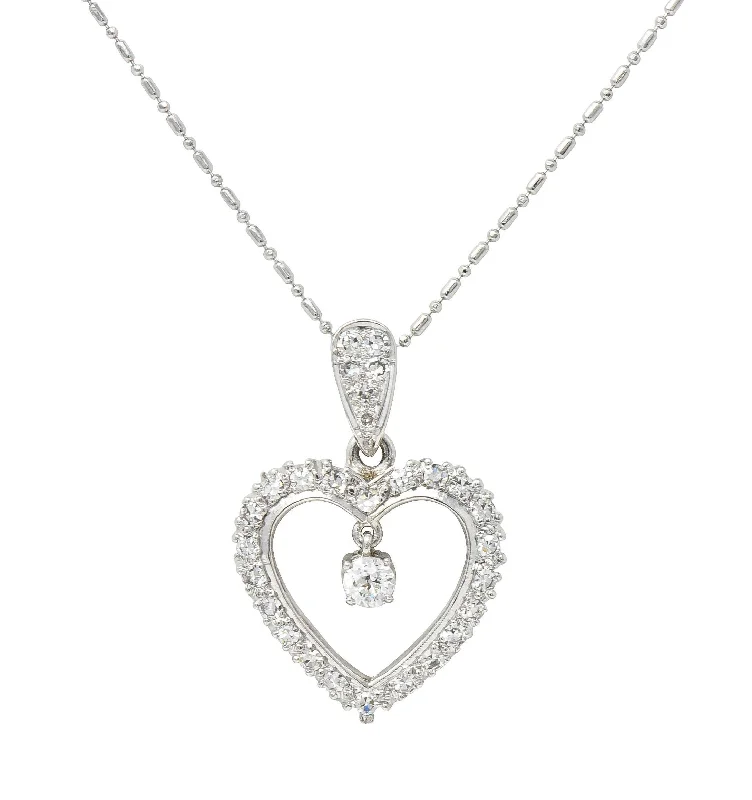 Fashion-Forward Geometric Jewelry For Contemporary Style Mid-Century 1.05 CTW Diamond Platinum Vintage Heart Pendant Necklace