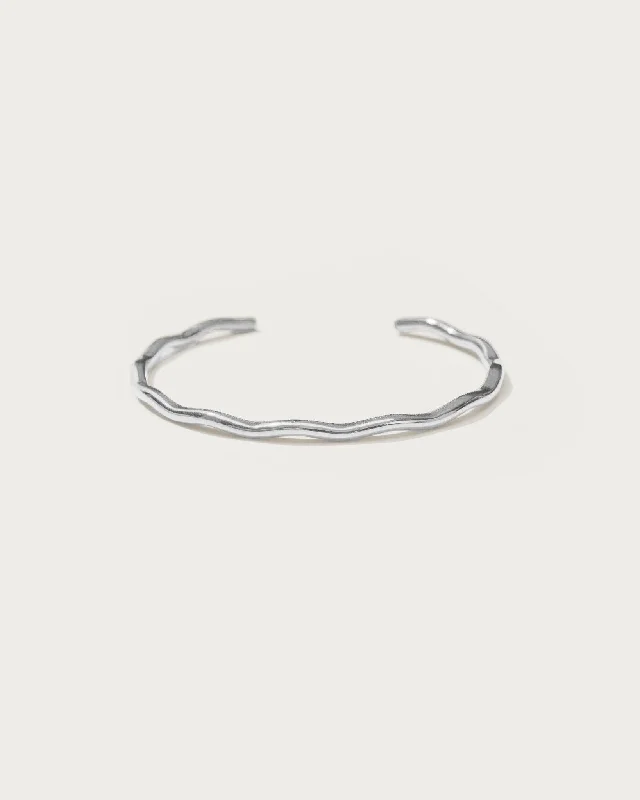 Make Your Outfit Shine With Discounted Jewelry Silver Wave Bangle