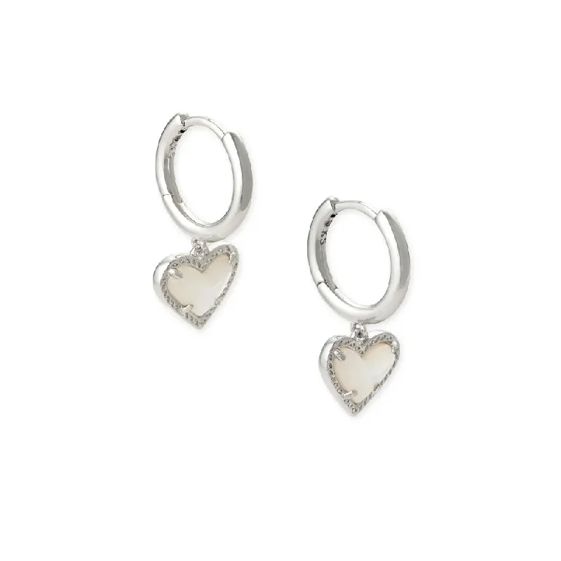 The Perfect Jewelry Piece At The Perfect Price Kendra Scott Ari Heart Rhodium Huggie Earrings in Ivory Mother of Pearl