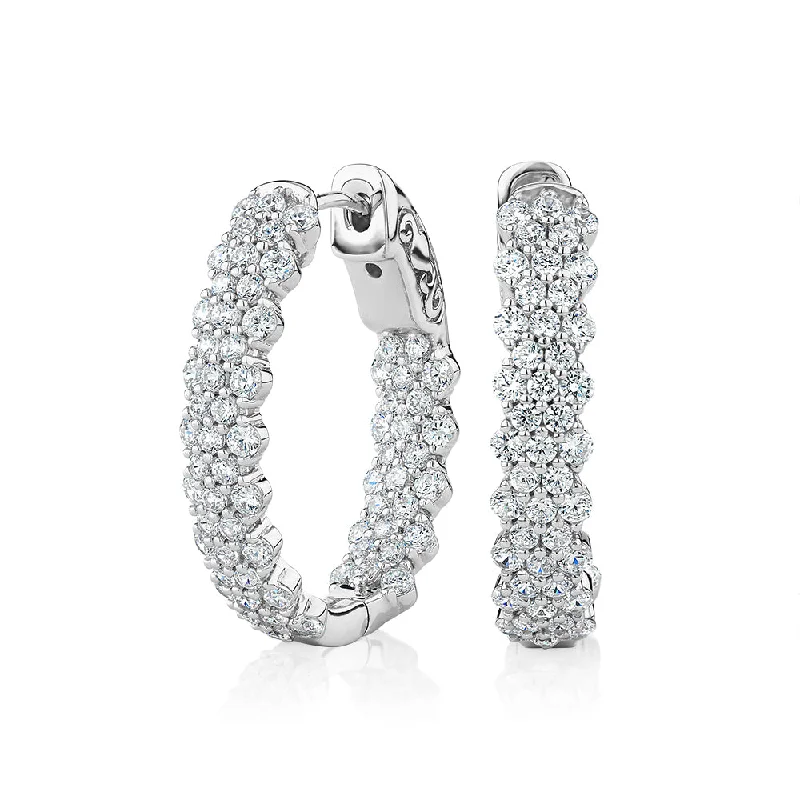 Sparkle On A Budget – Fine Jewelry For Less Round Brilliant hoop earrings with 2.32 carats* of diamond simulants in sterling silver