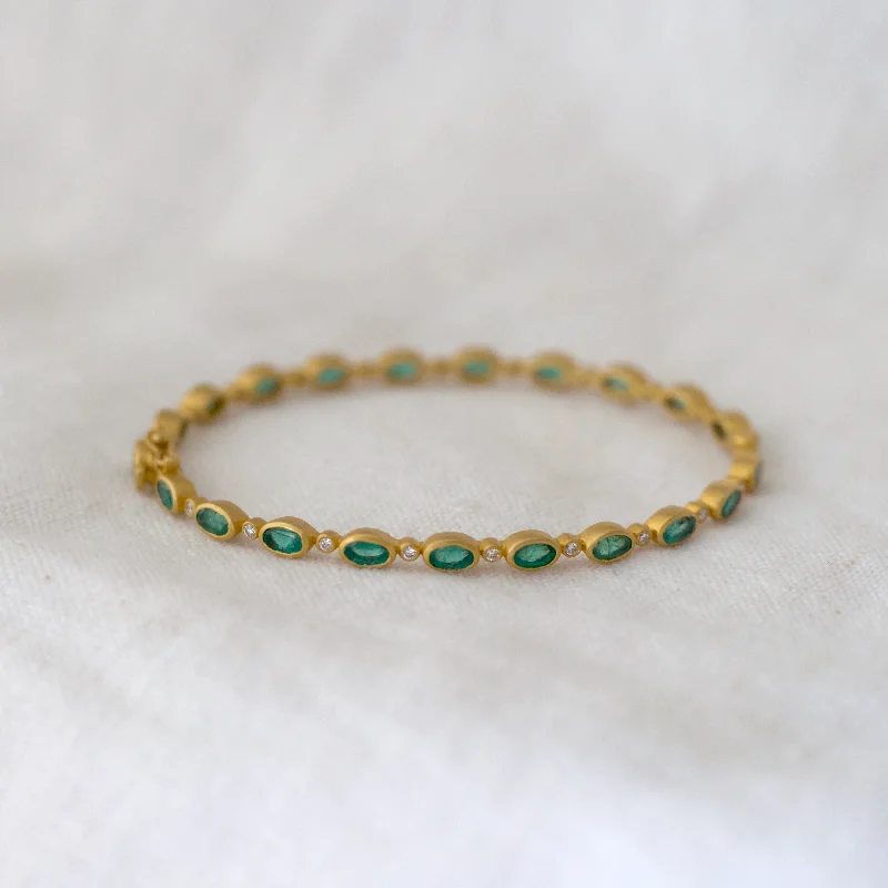 Make Every Moment Shine – Jewelry Discounts Available Emerald and Diamond Bangle