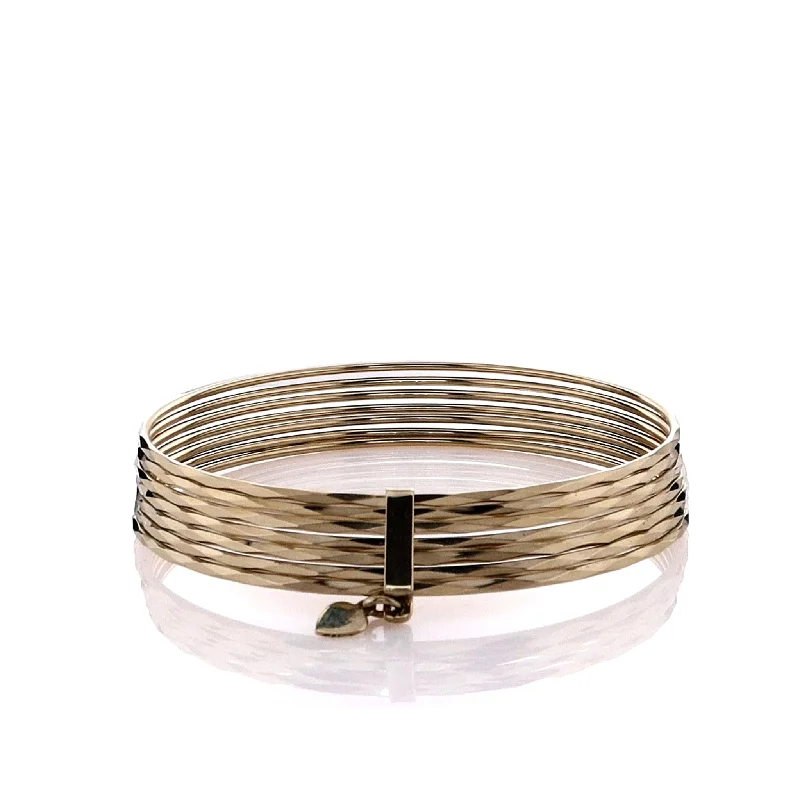 Breathtaking Jewelry, Breathtaking Prices Estate 14k Yellow Gold Dangle Heart Diamond Cut Multi Bangle Bracelet